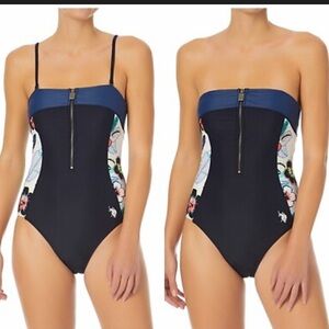 U.S. Polo Assn.
U.S. Polo Assn. Womens Side Panel Zip Front One Piece.